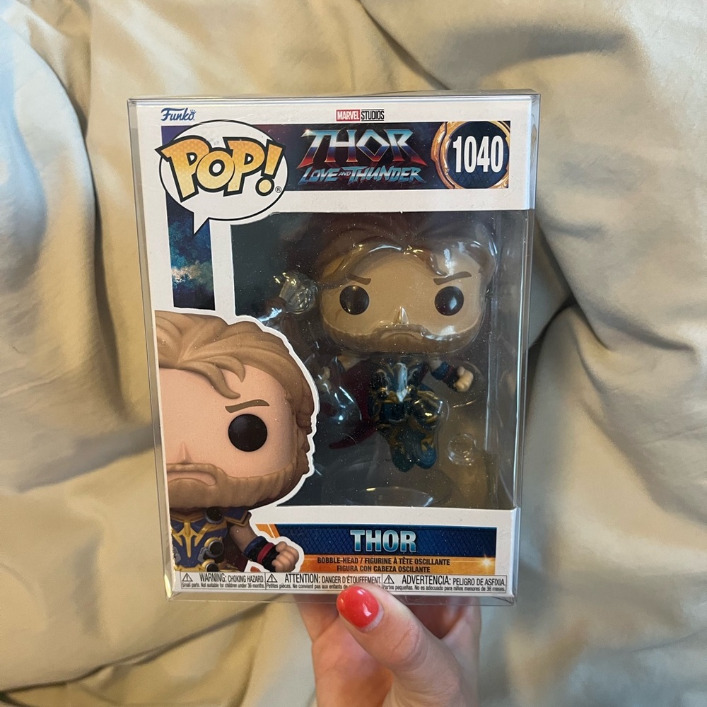 Funko Thor Figure with Blue and Gold Armor